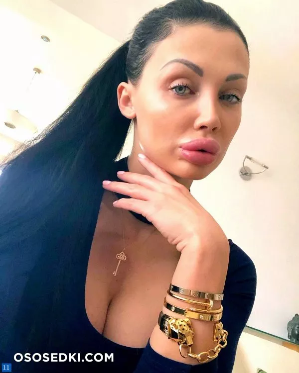 Whore with huge fake tits and lips - 11